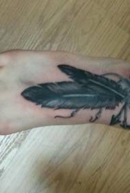 female instep arrow and feather tattoo pattern