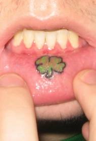 green clover tattoo pattern on the inside of the lips