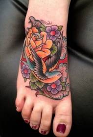 instep old school painted swallow flower tattoo pattern