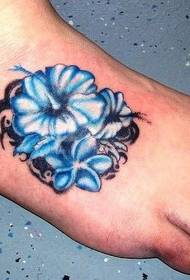 foot back drop totem with blue Hawaiian hibiscus tattoo pattern