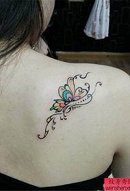 woman's shoulder color butterfly tattoo pattern