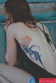 woman side waist color tree tattoo pattern