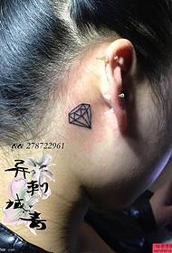 woman ear small fresh diamond tattoo pattern