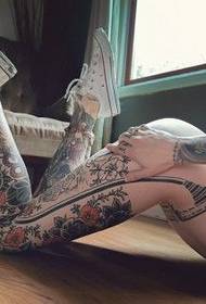 Female hips big flower legs tattoo pattern