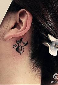 a small fresh ear tattoo pattern