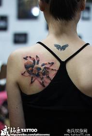 girl's shoulders look good spider tattoo pattern