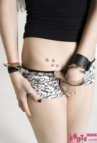 handcuffs beauty belly print tattoo
