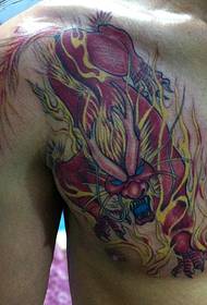 domineering chest fire unicorn tattoo