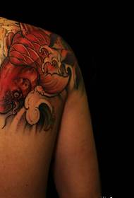 over the shoulder red squid tattoo picture stunning People