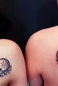 couple shoulders with active little dolphin tattoo pictures