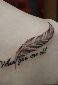 girl shoulder feather and letter tattoo pattern