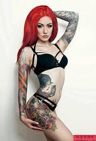 fotografia më e mirë e shfaqjes së tatuazheve të një gruaje seksi të tatuazheve me lule seksuale . 114855 @ modeli i tatuazheve të këmbëve të grave