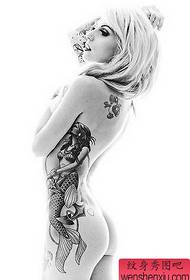 woman side waist mermaid tattoo works