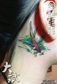 girls ear beautiful colored small swallow tattoo pattern