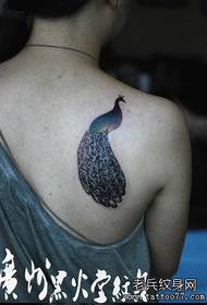 Girls shoulder fashion trend peacock tattoo pattern