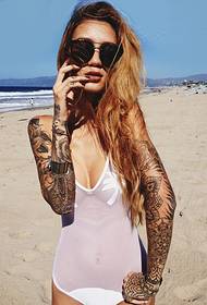 sexy beauty with beautiful tattoos with beautiful tattoos to enjoy the picture