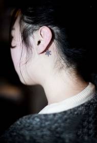 simple small snowflake tattoo pattern behind the ear