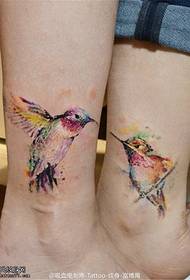 couple color splashing hummingbird tattoo pattern