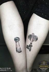 arm keyhole couple tattoo pattern