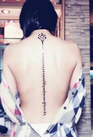 sexy Sanskrit tattoo picture of female spine