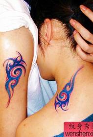 color couple totem tattoo