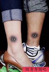 tatuaggio gamba totem amore totem
