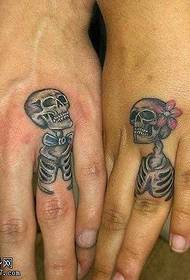 finger skull couple tattoo pattern
