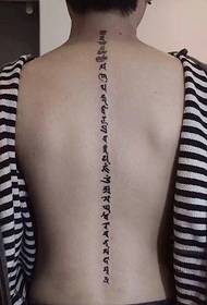 Sanskrito tatuiruotės tatuiruotė asmens stuburo