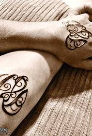 arm couple totem tattoo pattern
