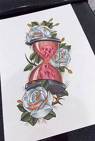 hourglass rose tattoo e ngotsoeng ka letsoho e sebetsa