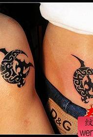 couple totem moon tattoo