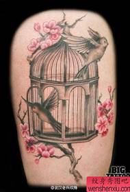 a group of various bird cages from