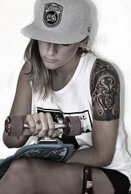 Tattoo girl fell in love with skateboarding