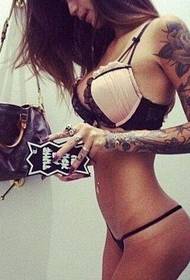 the combination of perfect body and tattoo reflects another beauty