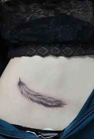 woman belly sexy feather tattoo