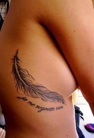 Female ribs beautiful and beautiful feather tattoo