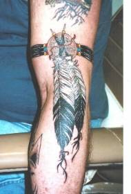 Arm Indian style colored armband and feather tattoo pattern