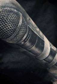 Exquisite black and white modern microphone arm tattoo pattern