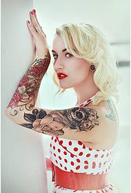 Trendy beauty arm tattoo