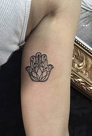 Inner arm lucky flower tattoo pattern