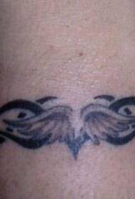 Arm wings tribal tattoo pattern