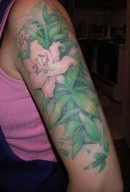 Arm lily and green leaf color tattoo pattern