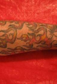 Small flame tattoo pattern on the arm
