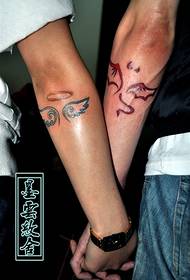 Couple arm demon and angel totem tattoo