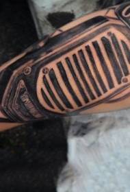 Arm very personal black vintage microphone with letter tattoo pattern