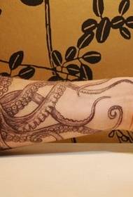 Handsome octopus tattoo with arms