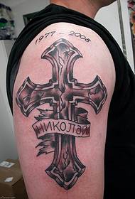 Good-looking cross english tattoo