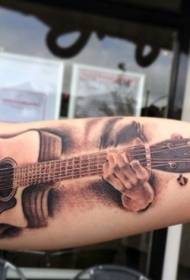 Very realistic musician with arm playing guitar tattoo pattern