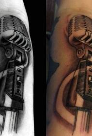 Arm hand drawn colored big microphone tattoo pattern