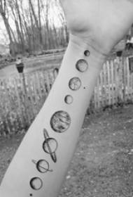 Arm tattoo on black and white gray style prick tattoo geometric element tattoo small planet tattoo picture